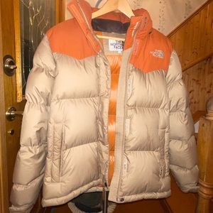 Beige north face puffer jacket